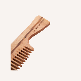Unleash the transformative power of Ayurveda with Art of Vedas Neem Wood Comb, a sustainable and eco-friendly comb that gently detangles and massages your scalp, promoting healthy hair growth and scalp vitality.